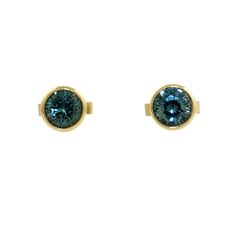 Hoop earrings with snake print designs for an edgy, wild appearance-14k x Montana Sapphire Studs