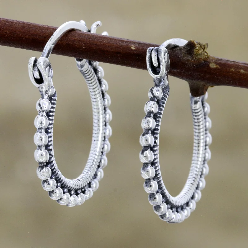 Hoop earrings with a matte black finish for a sleek, edgy vibe-Brightly Shining Beaded Sterling Silver Hoops from India