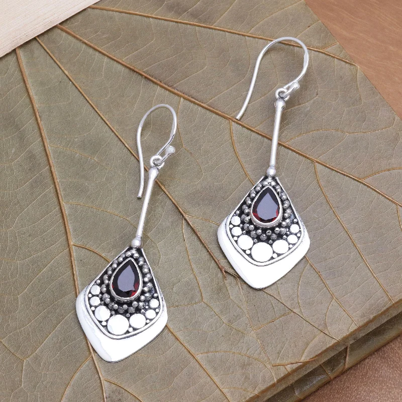 Best hoop earrings with floral designs for a feminine and delicate look-Elegant Arrangement Garnet and Sterling Silver Dangle Earrings