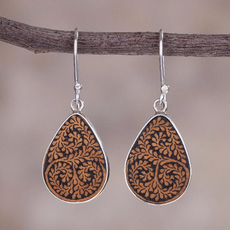 Hoop earrings with a chunky design for a bold and trendy statement-Enchanted Copse Leafy Sterling Silver and Pumpkin Shell Earrings from Peru