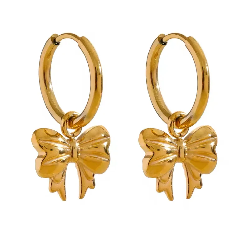 Hoop earrings with a matte finish for a sleek and sophisticated appearance-Gold Bow Huggie Hoops by Lauren Kenzie