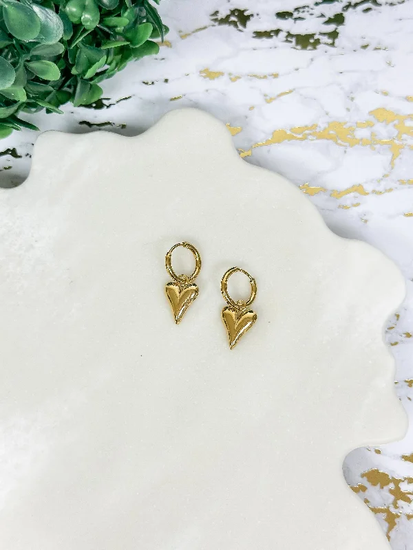 Best hoop earrings with matte finish for a sophisticated, understated design-Golden Heart Huggie Hoops by Lauren Kenzie