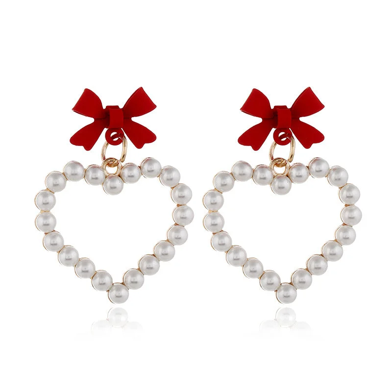 Drop Earrings with Enamel Coating -Wholesale Pearl Hollow Heart Shaped Pendant Bow Alloy Earrings